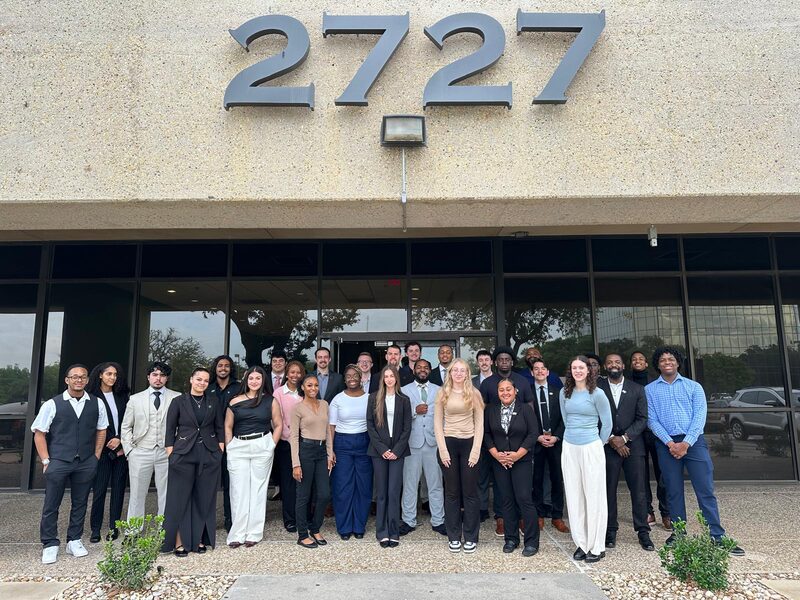 The team outside the 5 Pillar Solutions office