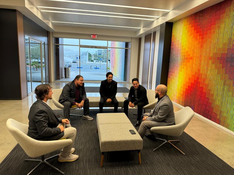 Team members in a modern office lounge