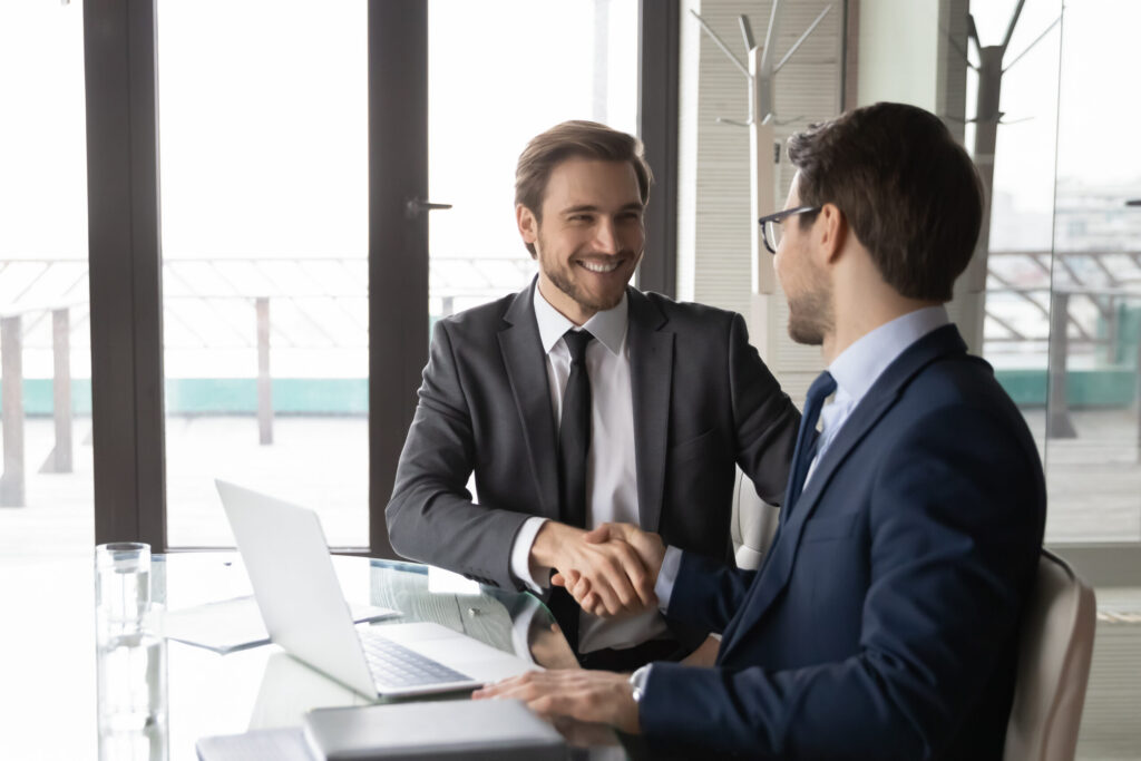 Positive conversation between a sales professional and his client